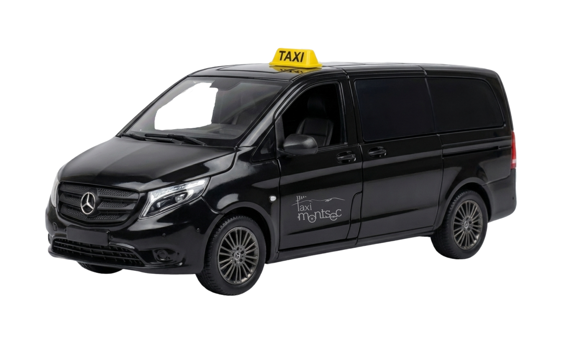 furgoneta de joguina – taxi montsec (1) Furgoneta de joguina que representa un taxi de la Vall d'Àger de Taxi Montsec.